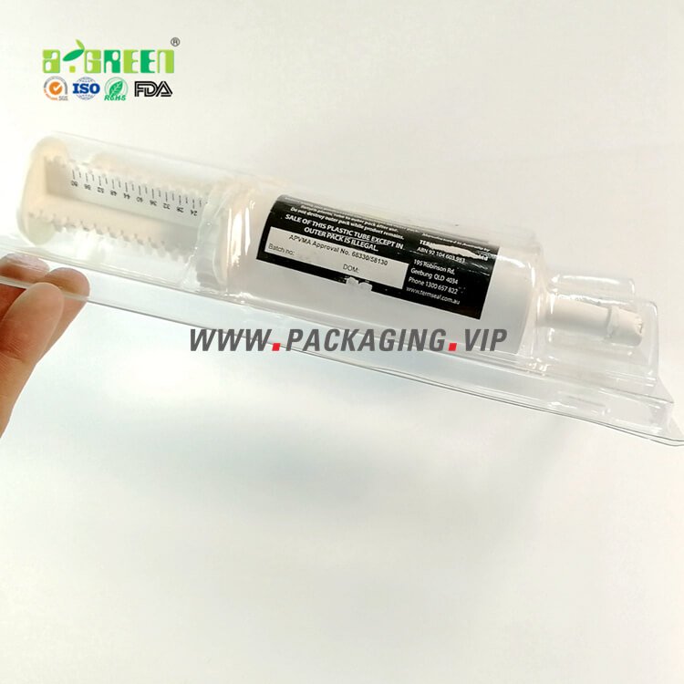 PVC clamshell with hole to pack two syringes